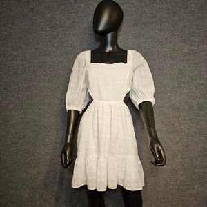 Minkpink size medium‎ white dress with a square neckline and a tiered skirt.